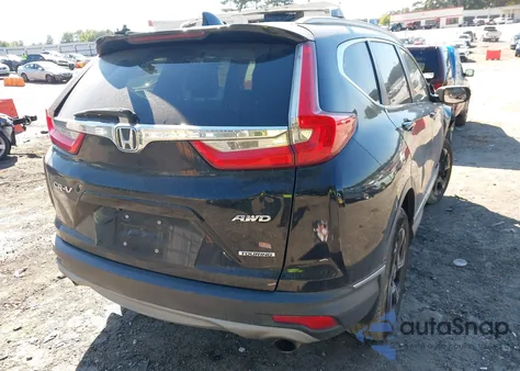 2018 Honda Cr-V Touring z USA, uszkodzony, nr VIN 7FARW2H94JE099983